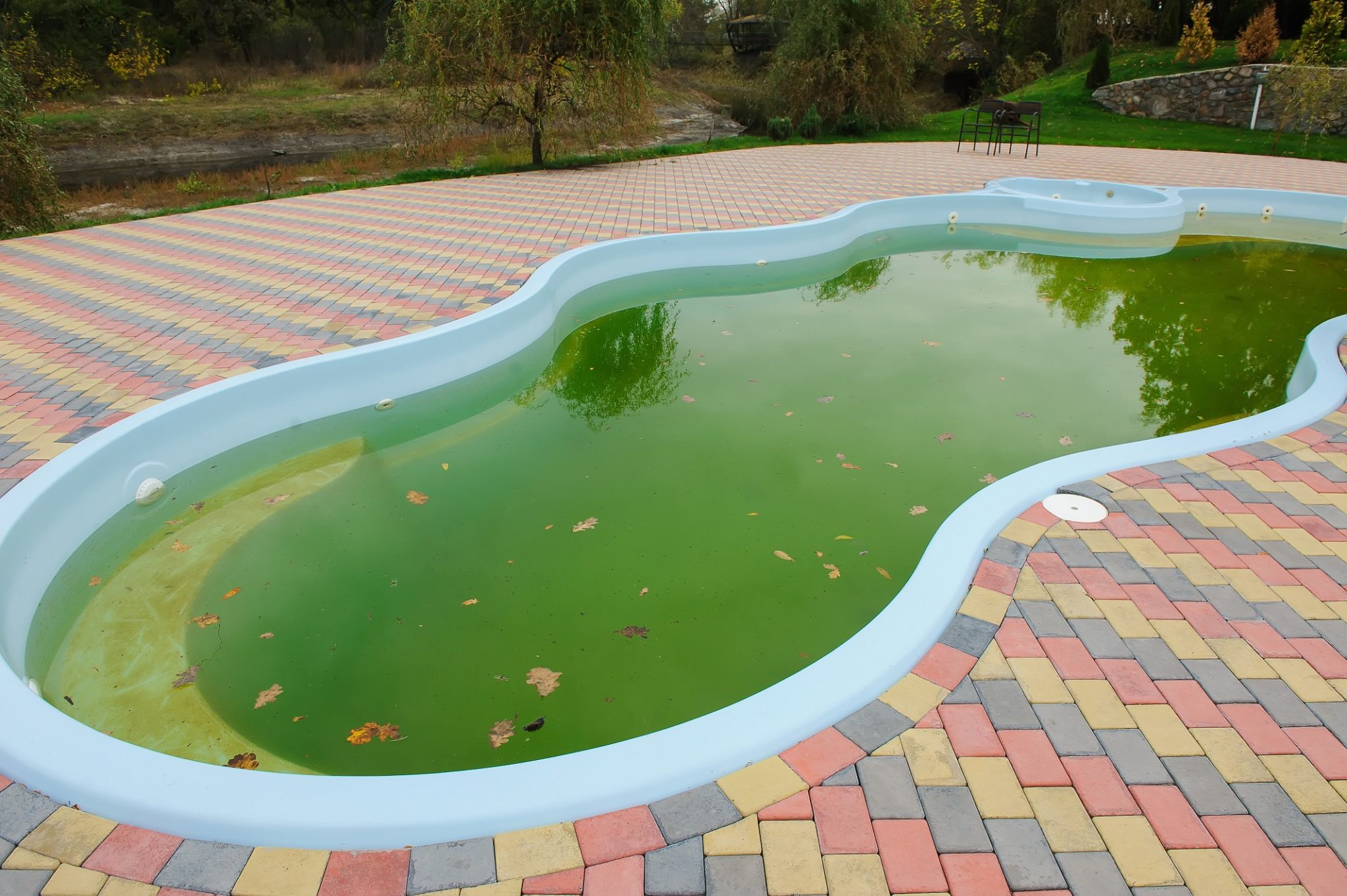 pool slightly green and cloudy